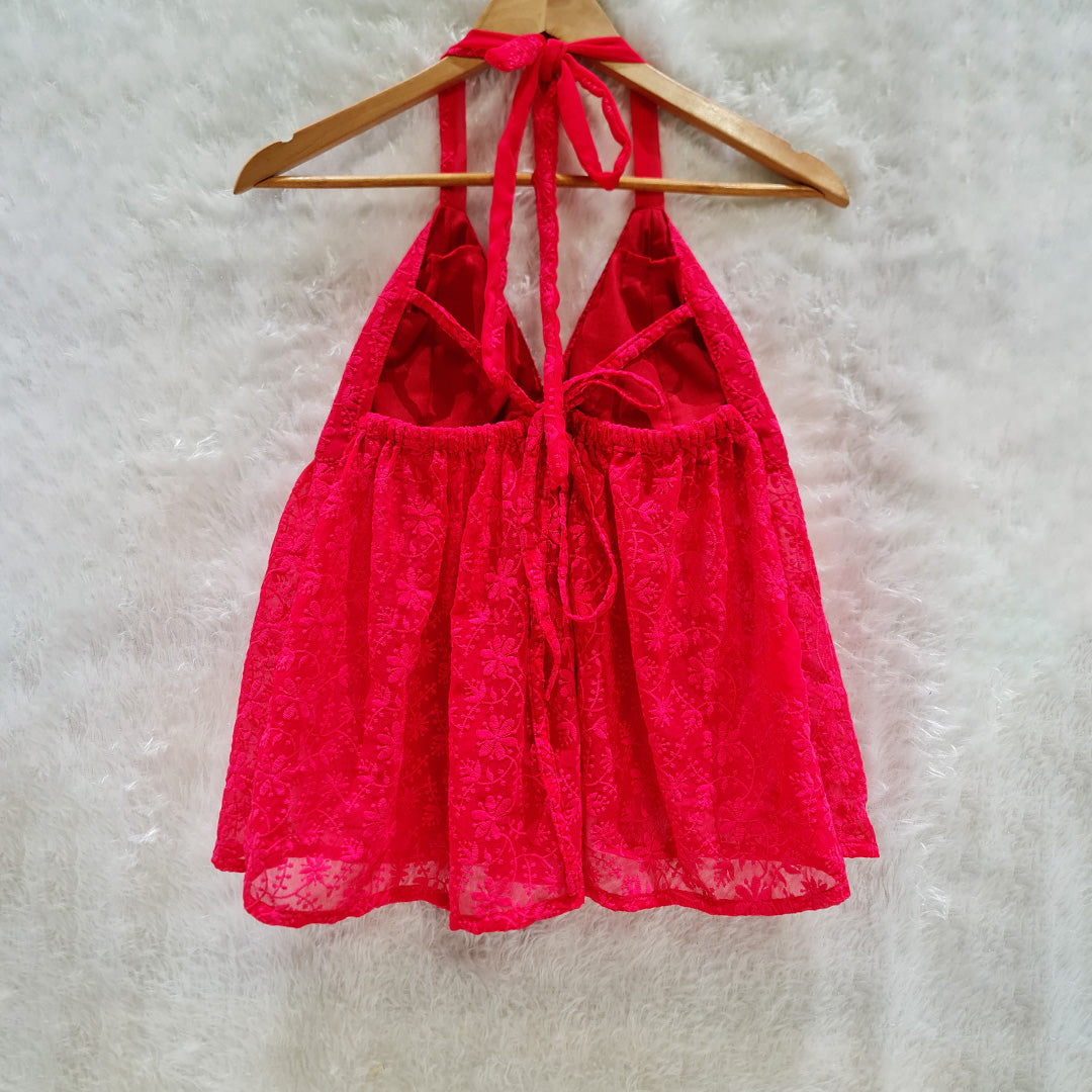 Sheer Luxury in Every Stitch: The Padded Halter Neck Top with Delicate Details