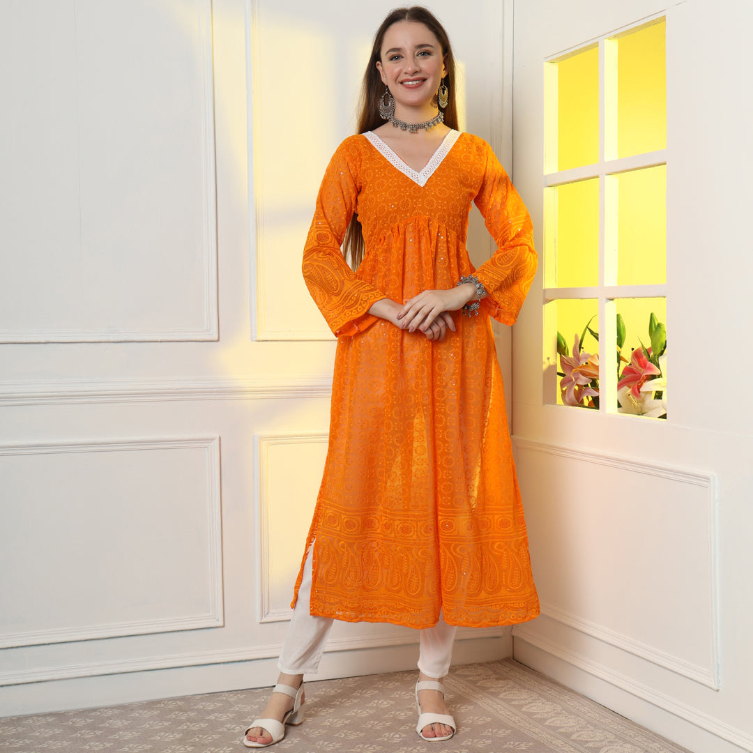 A Touch of Lucknowi Luxury: The Paisley Embroidered Chikankari Kurta Set with intricate white embroidery on elegant fabric.