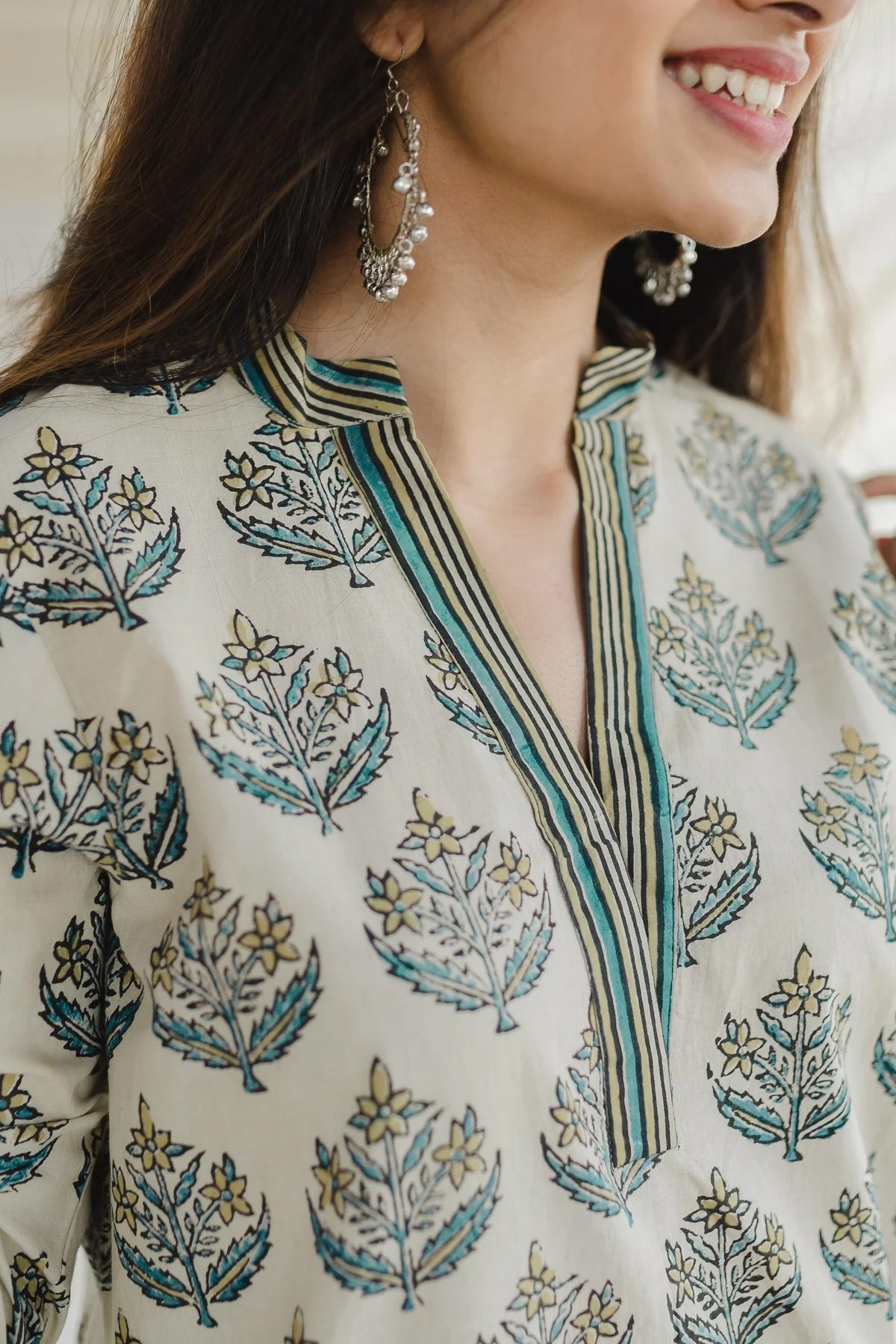 Ajrakh Cotton Kurta Palazzo Set: A comfortable two-piece set featuring a straight kurta and wide-leg palazzo pants, both made from breathable cotton and adorned with traditional Ajrakh block prints.