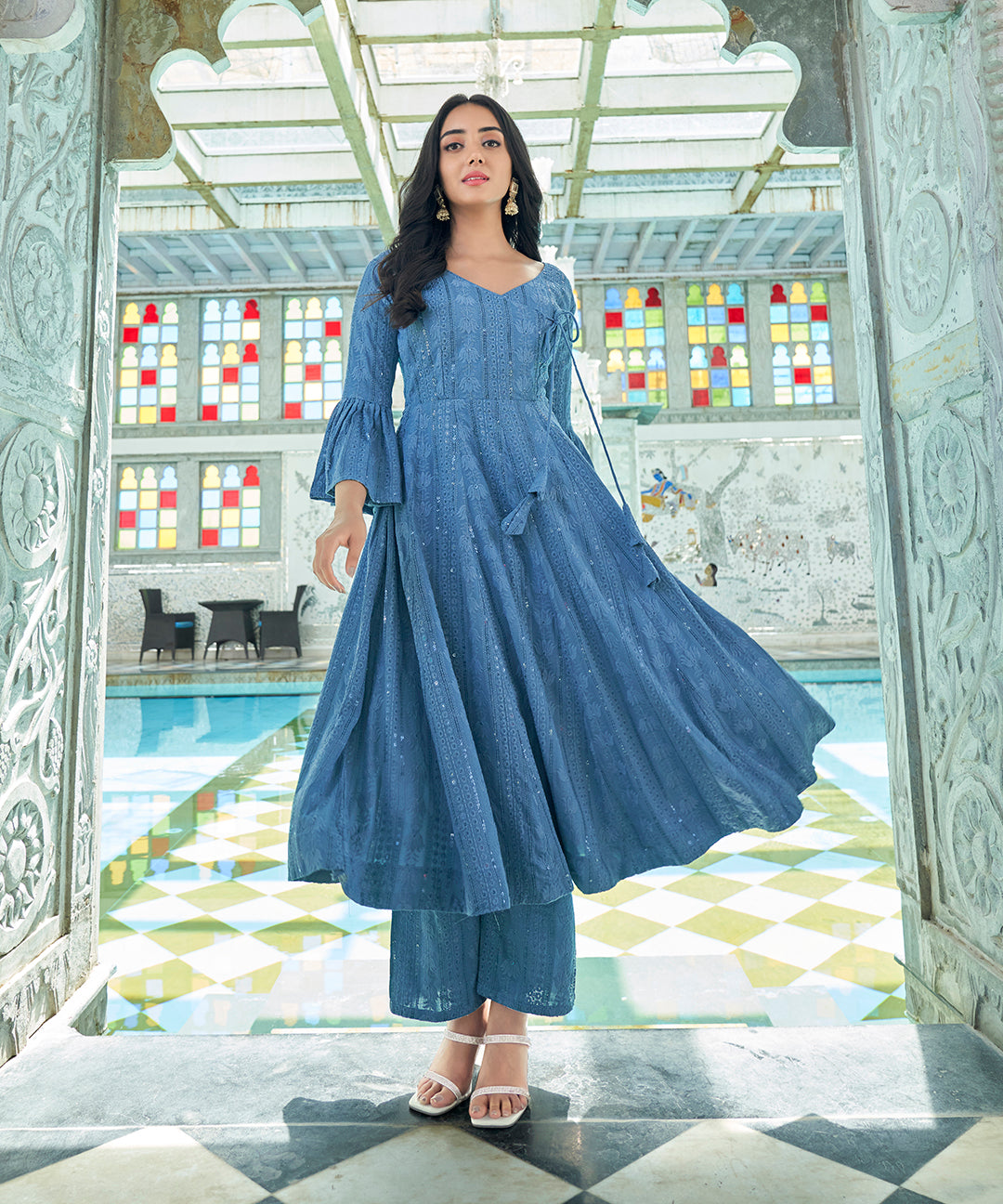A Baby Blue Rayon Suit Set, combining comfort and elegance with its gentle hue and stylish design.