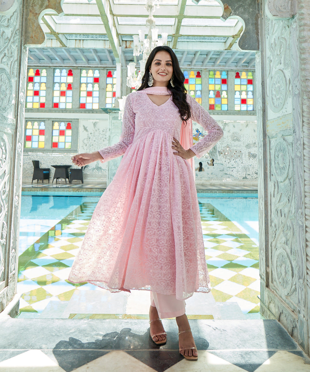 Baby pink Georgette Anarkali suit set featuring an elegant design and flowing silhouette