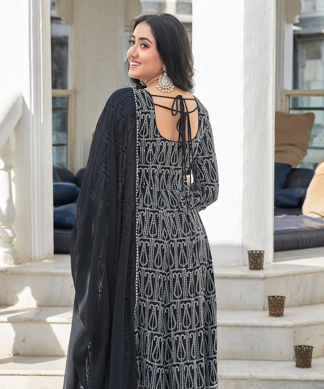 A sophisticated Black Irish Chikankari Suit Set, adorned with delicate chikankari embroidery for a timeless and elegant look.