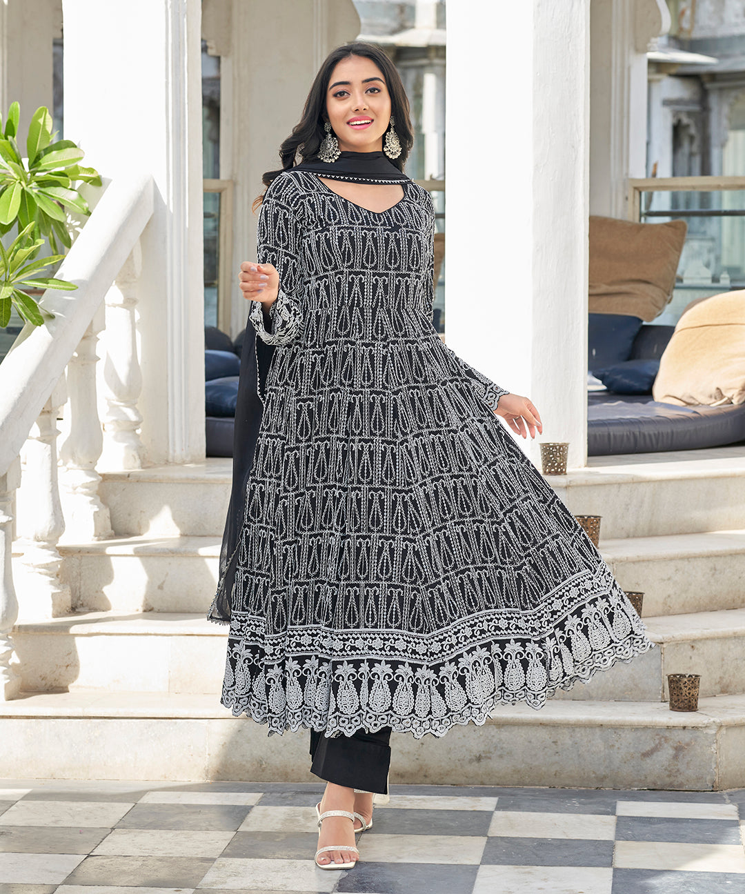 A sophisticated Black Irish Chikankari Suit Set, adorned with delicate chikankari embroidery for a timeless and elegant look.
