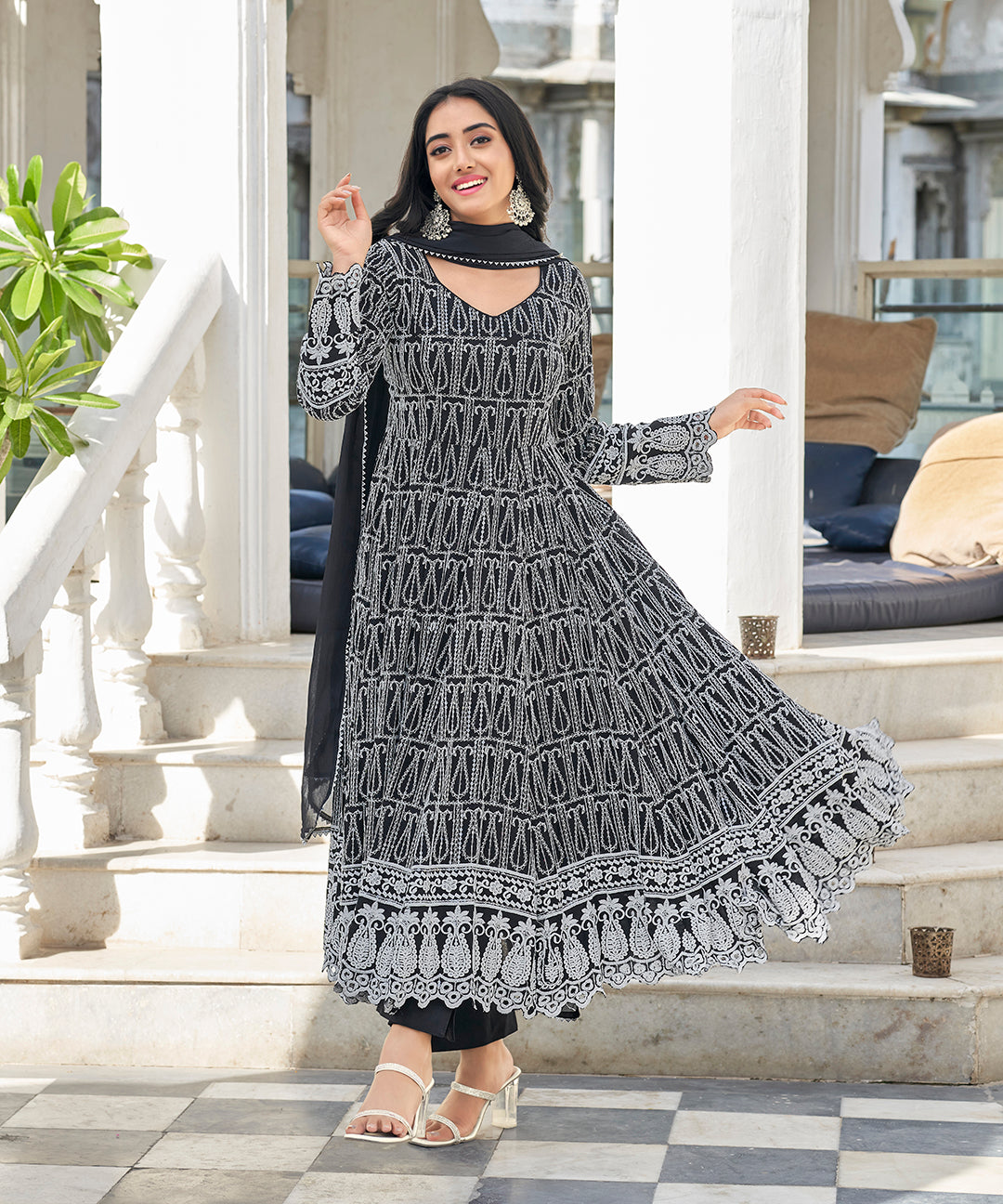 A sophisticated Black Irish Chikankari Suit Set, adorned with delicate chikankari embroidery for a timeless and elegant look.