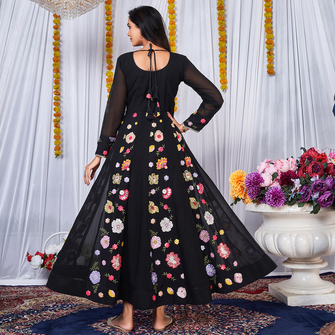 A black Anarkali gown adorned with vibrant multicolor embroidery.