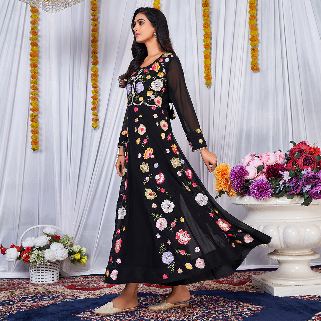 A black Anarkali gown adorned with vibrant multicolor embroidery.