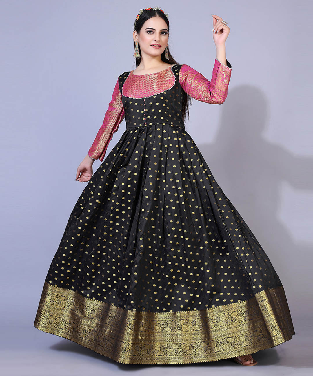 Black and pink polka dots jacquard ethnic maxi gown featuring a fitted bodice and flared skirt for a chic and festive appearance.