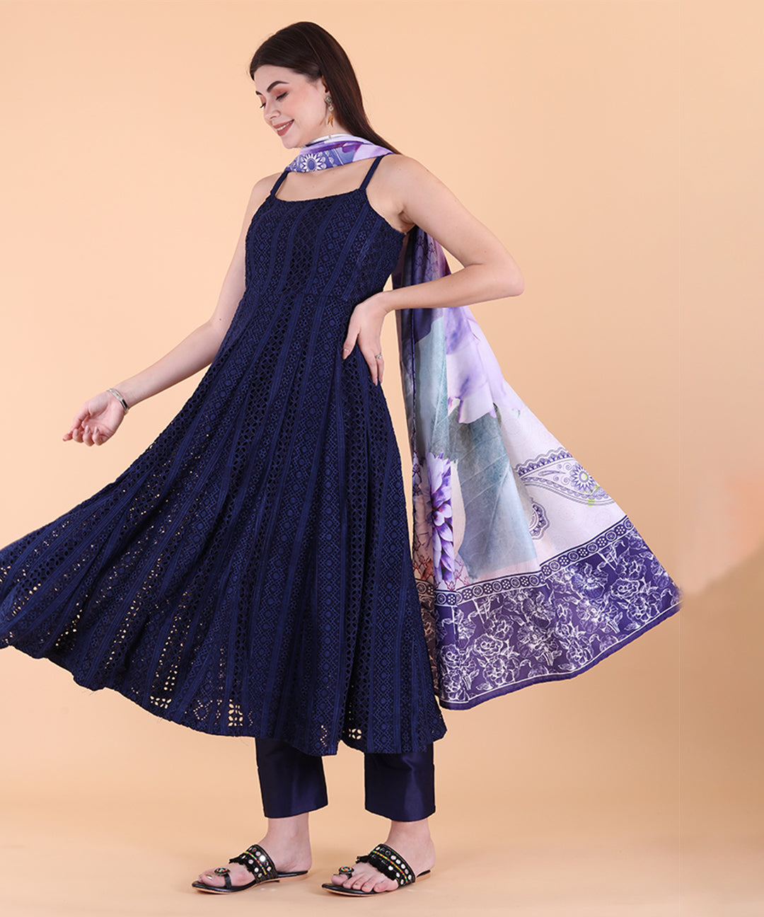 Blue Schiffli embroidered suit set featuring intricate patterns and elegant design