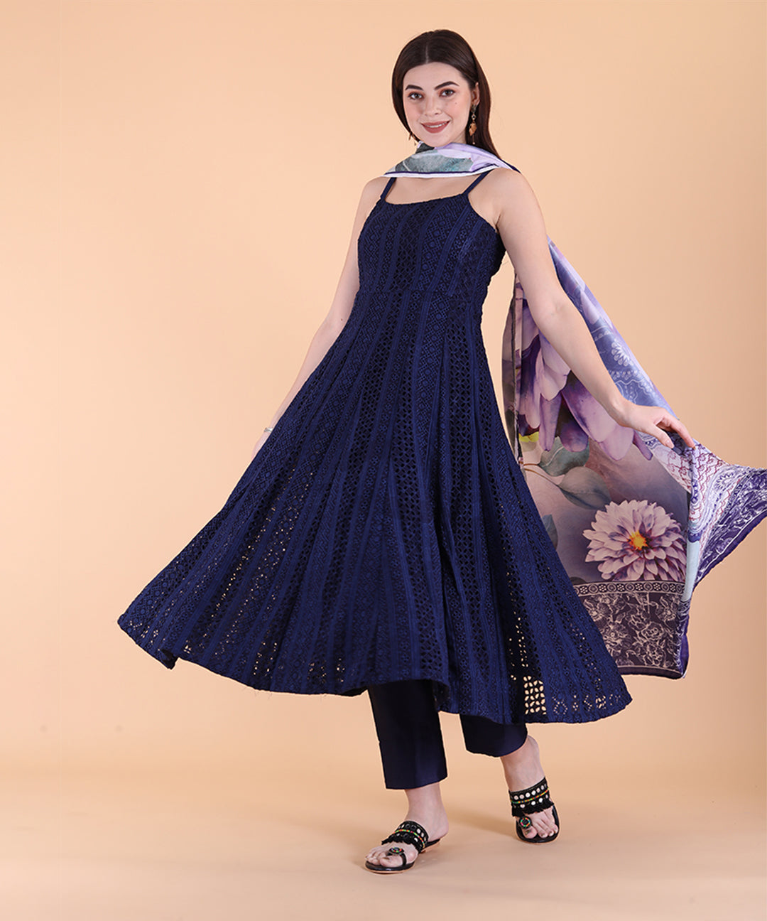 Blue Schiffli embroidered suit set featuring intricate patterns and elegant design