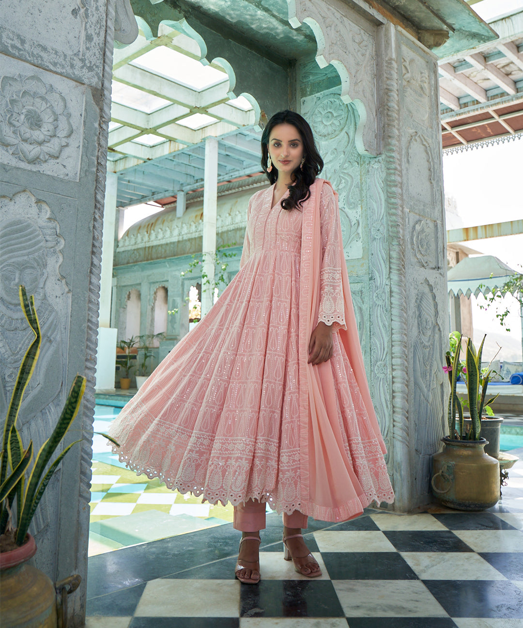 Burnt peach rayon Anarkali suit set featuring a flowing silhouette and elegant design