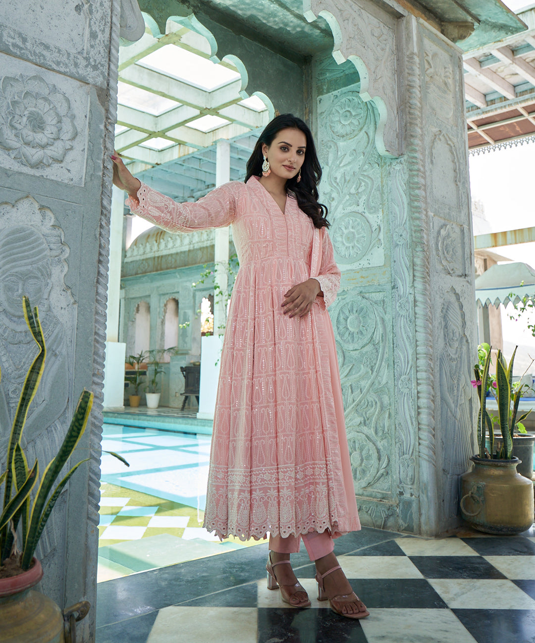 Burnt peach rayon Anarkali suit set featuring a flowing silhouette and elegant design