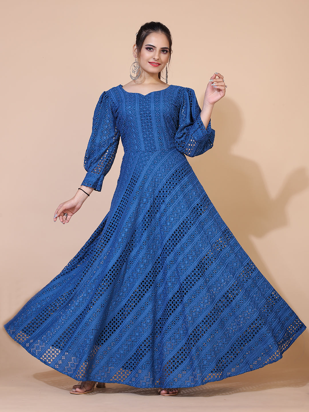 Classic turquoise blue Lucknowi embroidered gown with a flowing floor-length silhouette.
