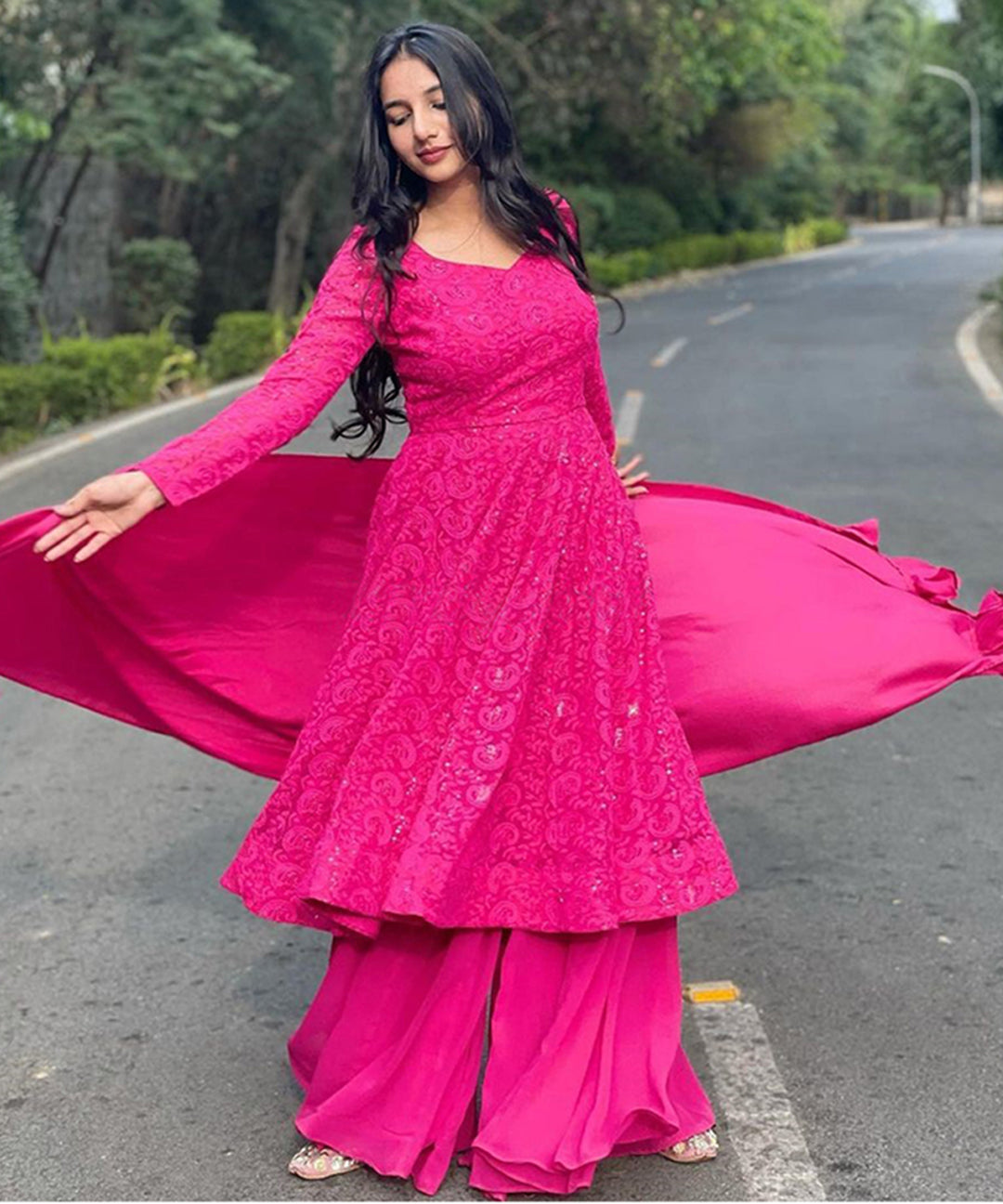 Dark pink georgette sharara suit featuring intricate Lucknowi embroidery