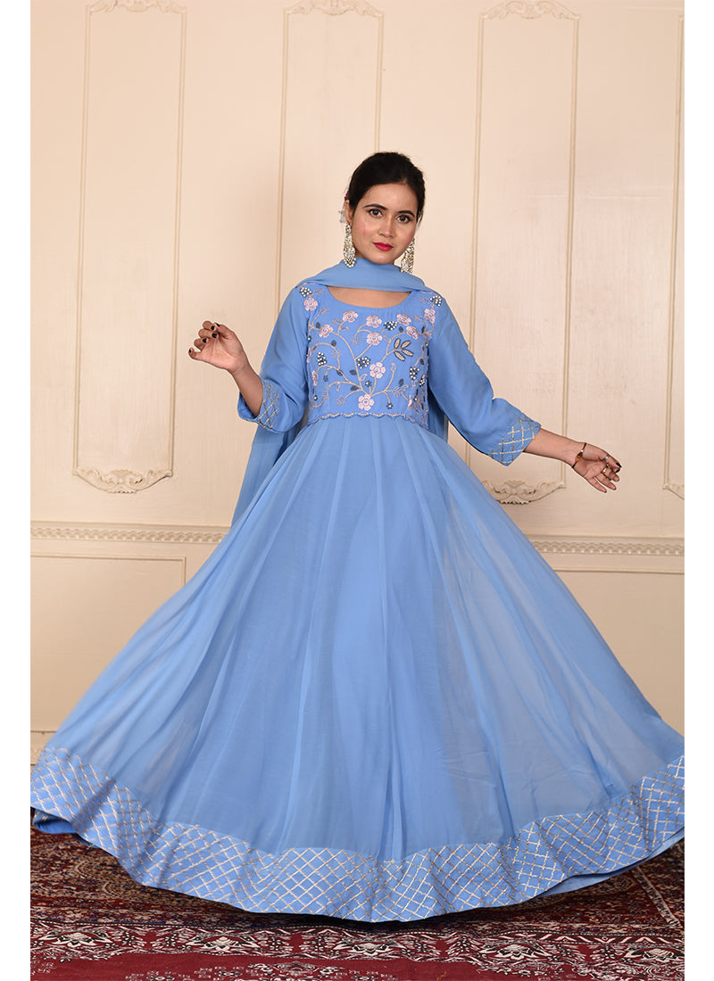 A stunning designer ensemble featuring intricate embroidery, shimmering motiwork embellishments, and a luxurious dupatta for a complete and glamorous look.