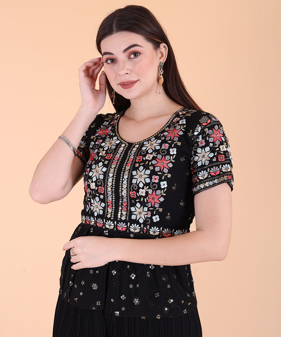 Fresh black embroidered sharara set showcasing intricate detailing and elegant design