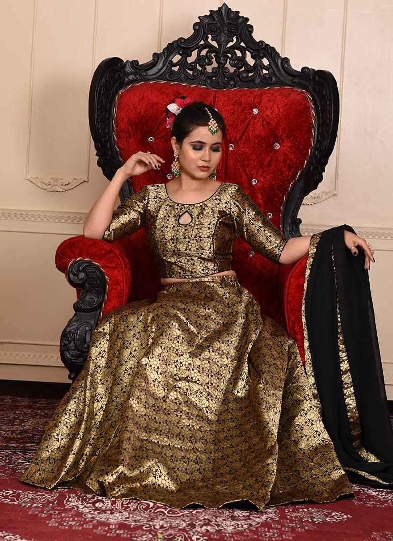 Black lehenga with gold woven details, ready to wear with blouse and dupatta.