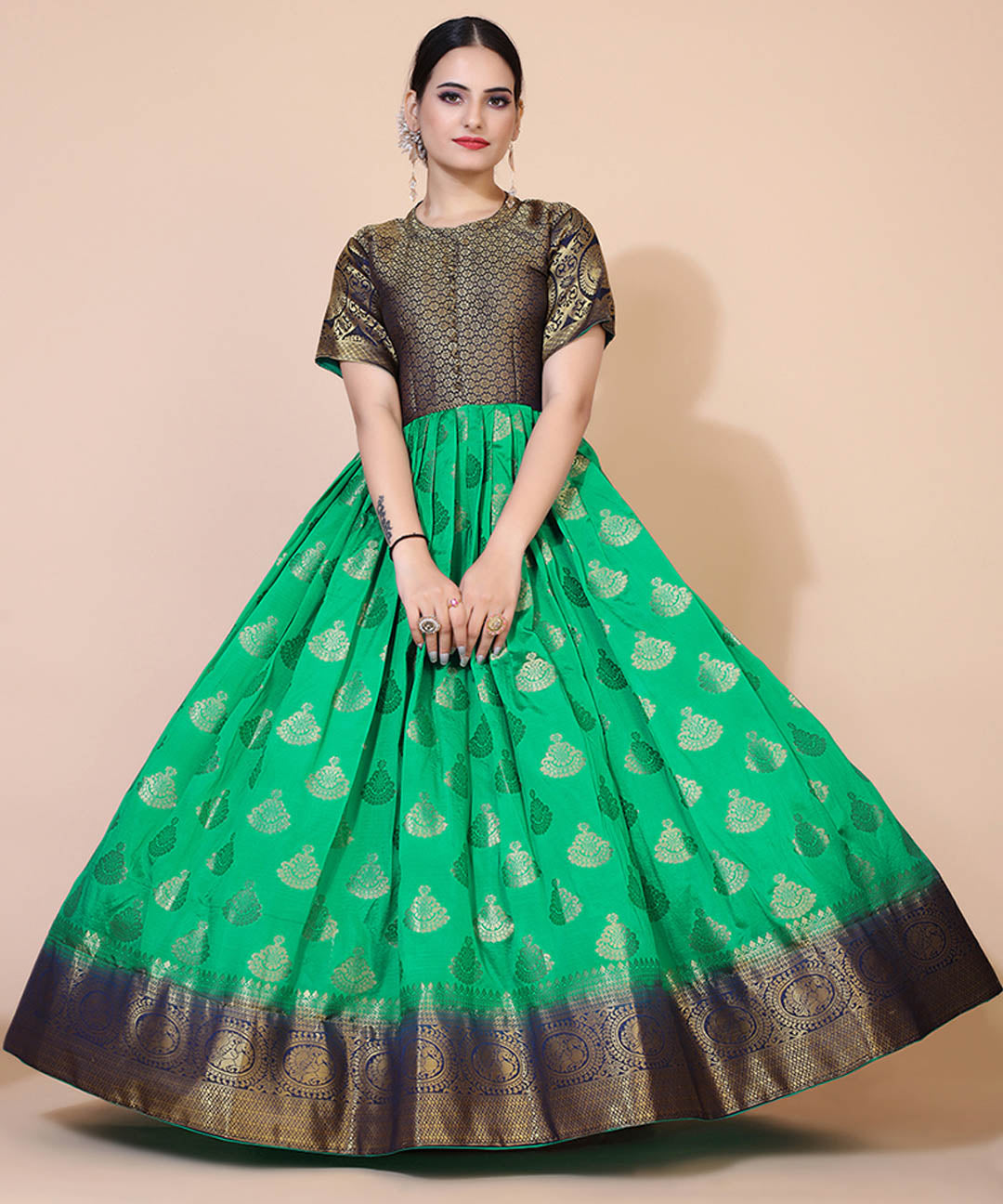 Green floral jacquard maxi dress, perfect for elegant and formal occasions with a touch of sophistication.