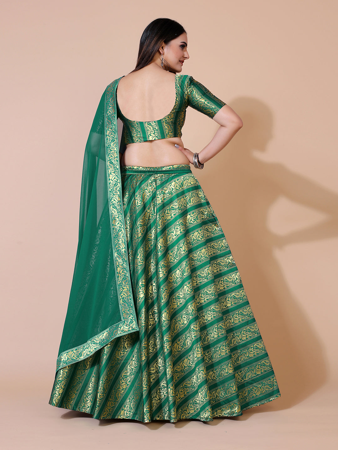 Green lehenga set with ready-to-wear blouse and dupatta.