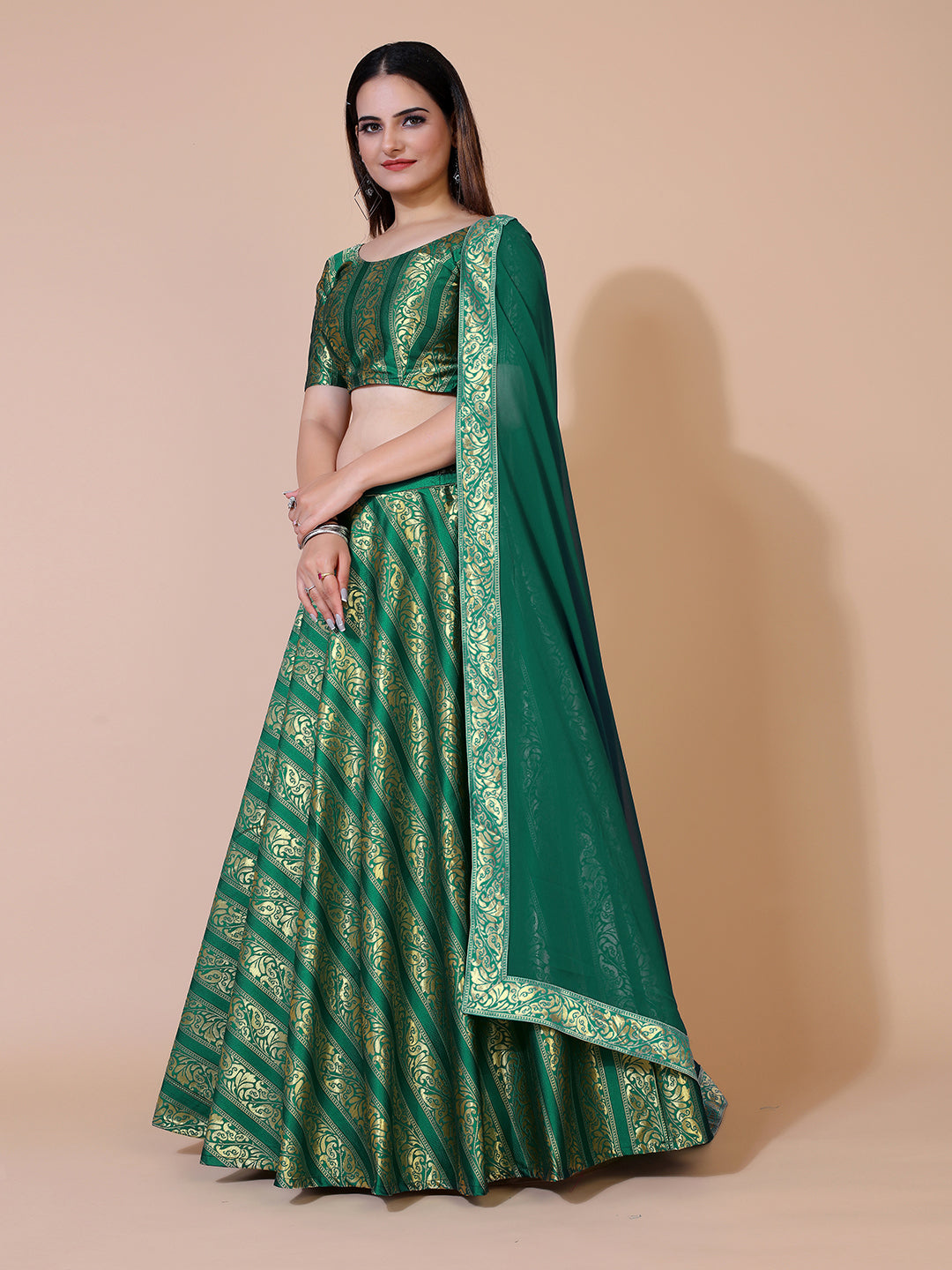 Green lehenga set with ready-to-wear blouse and dupatta.