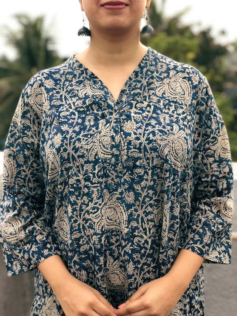 Indigo Kalamkari Kurta with Comfy Palazzos: A two-piece set featuring a long indigo kurta with beautiful Kalamkari prints and comfortable elasticated palazzo pants, both made from breathable cotton.