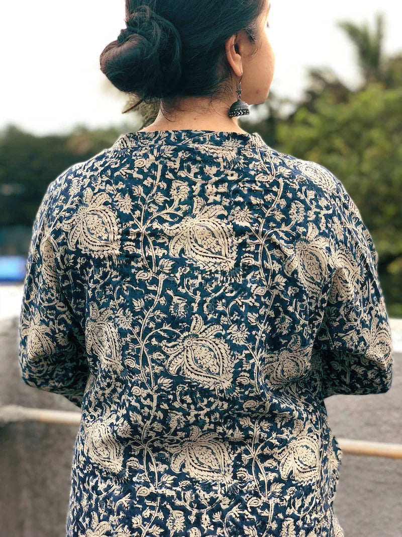 Indigo Kalamkari Kurta with Comfy Palazzos: A two-piece set featuring a long indigo kurta with beautiful Kalamkari prints and comfortable elasticated palazzo pants, both made from breathable cotton.