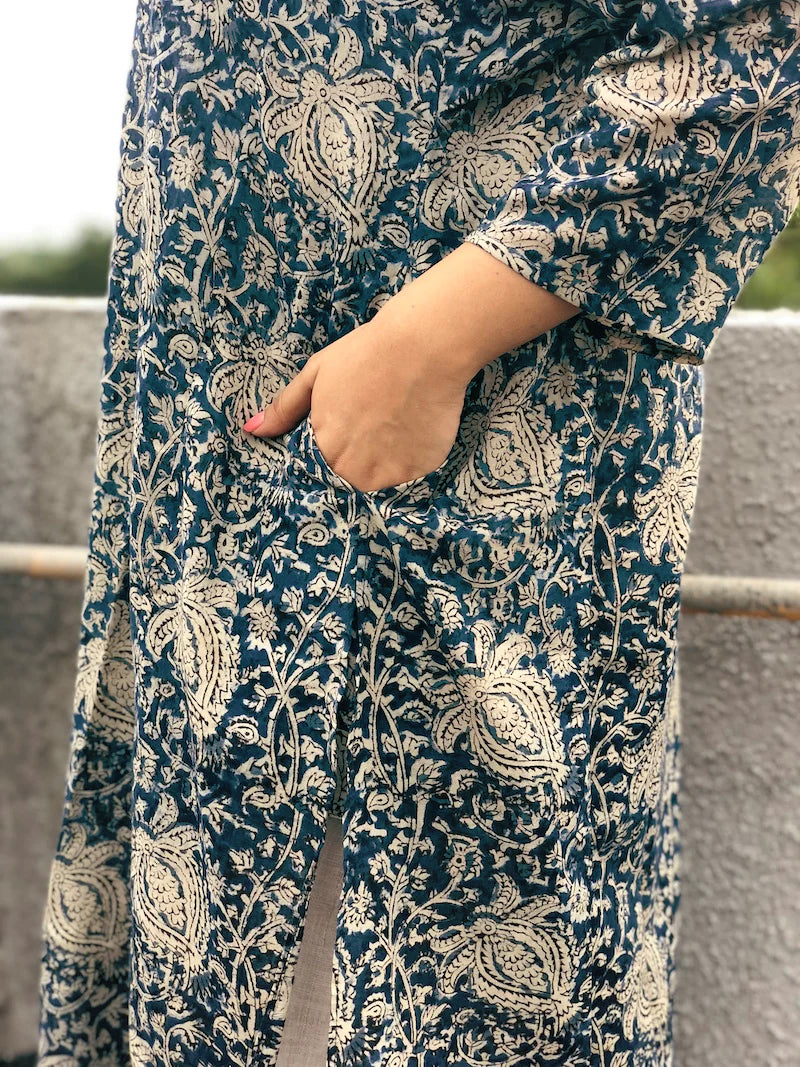 Indigo Kalamkari Kurta with Comfy Palazzos: A two-piece set featuring a long indigo kurta with beautiful Kalamkari prints and comfortable elasticated palazzo pants, both made from breathable cotton.