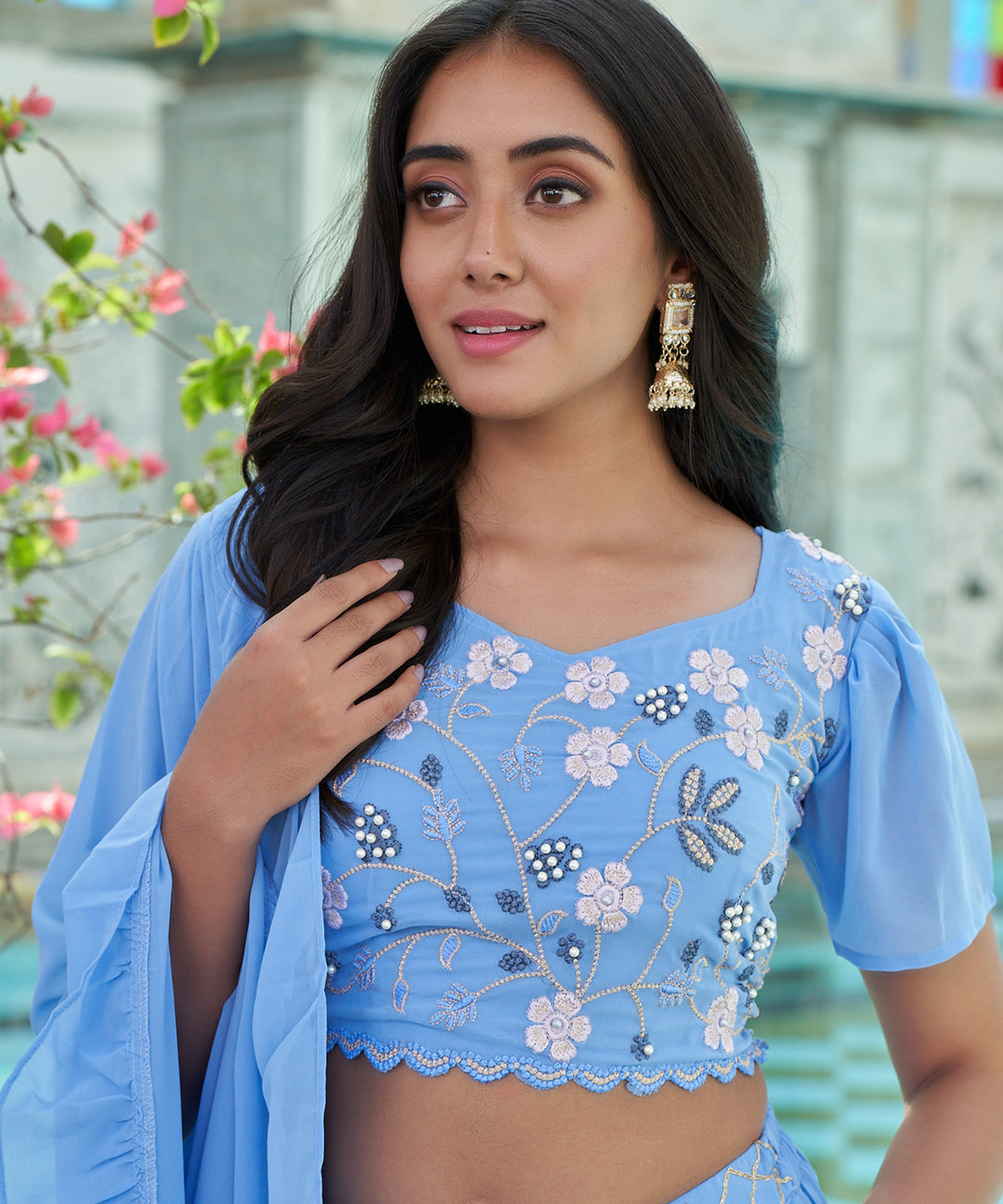 Light blue Georgette lehenga choli set showcasing a flowing silhouette and elegant design