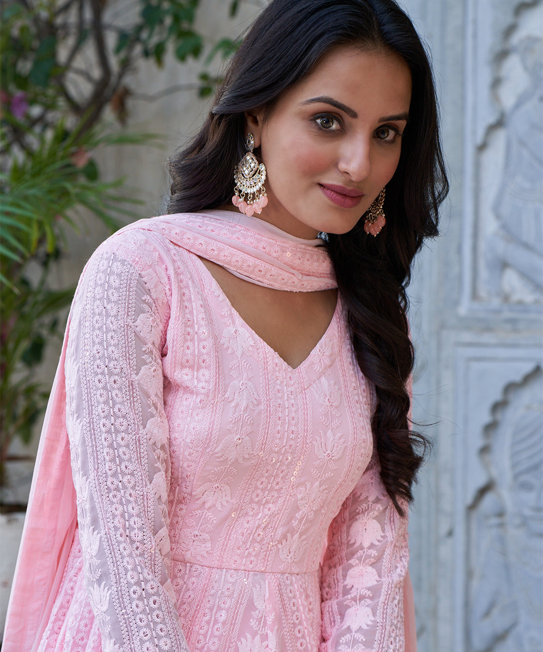 Light pink Lucknowi embroidered Georgette Anarkali suit featuring intricate detailing and a graceful design