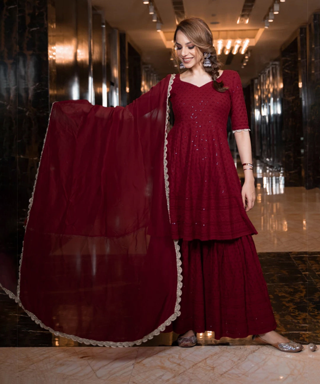 Maroon Chikankari Sharara featuring intricate embroidery and elegant design