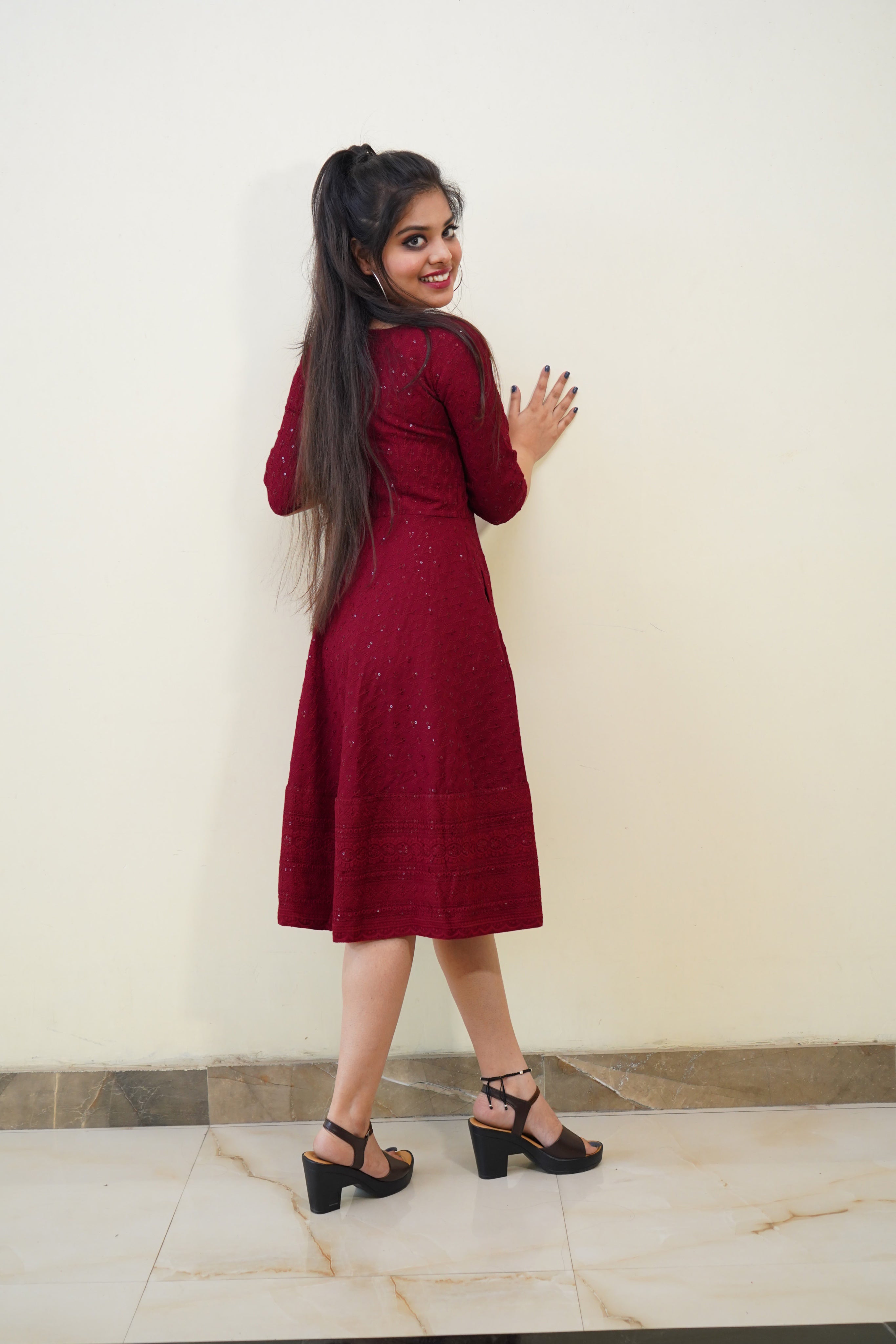 Elegant maroon rayon dress featuring intricate Lucknowi Chikankari embroidery, perfect for parties and special occasions.