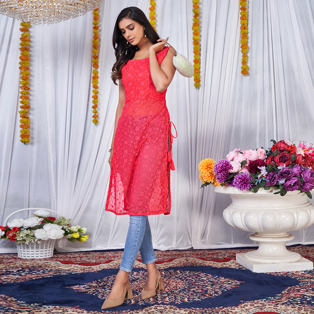 Pink Lucknowi embroidered side tassel kurta, exuding elegant simplicity