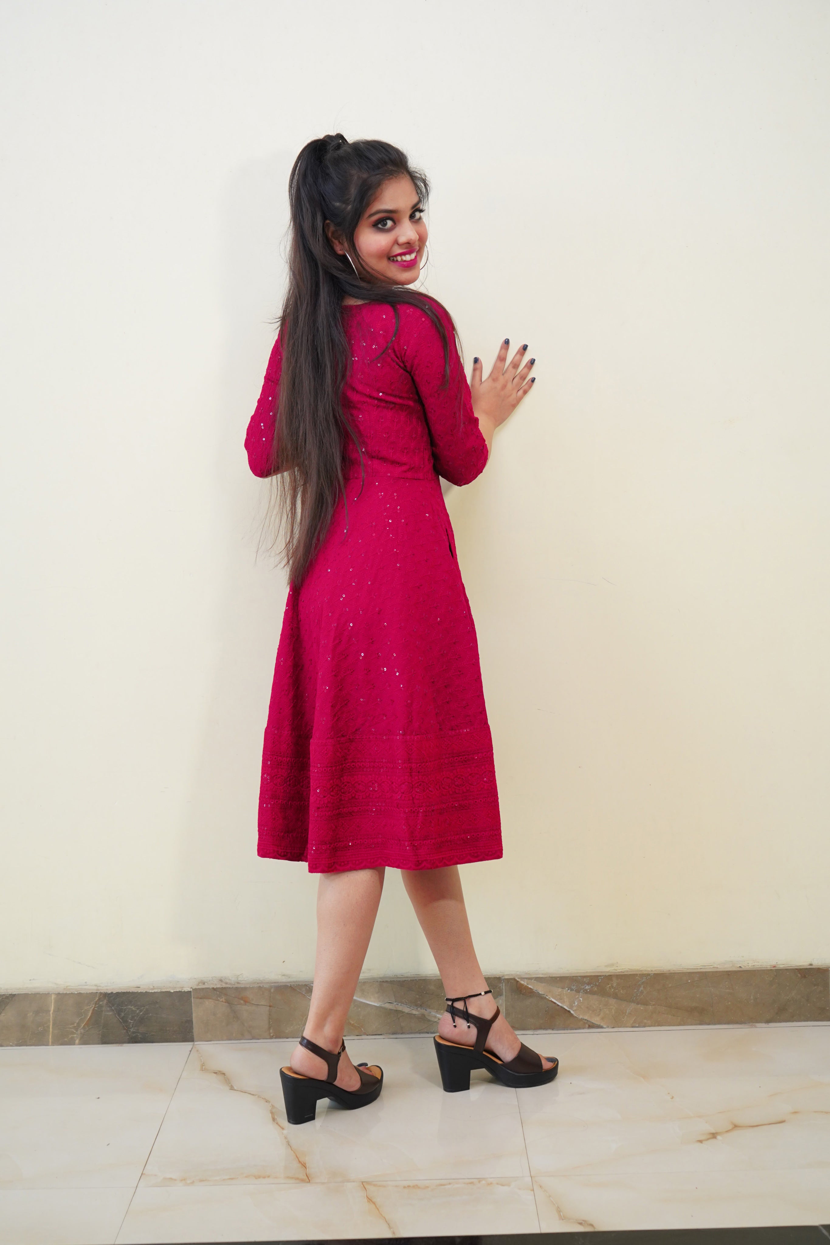 Elegant pink rayon dress featuring intricate Lucknowi Chikankari embroidery, perfect for parties and special occasions.