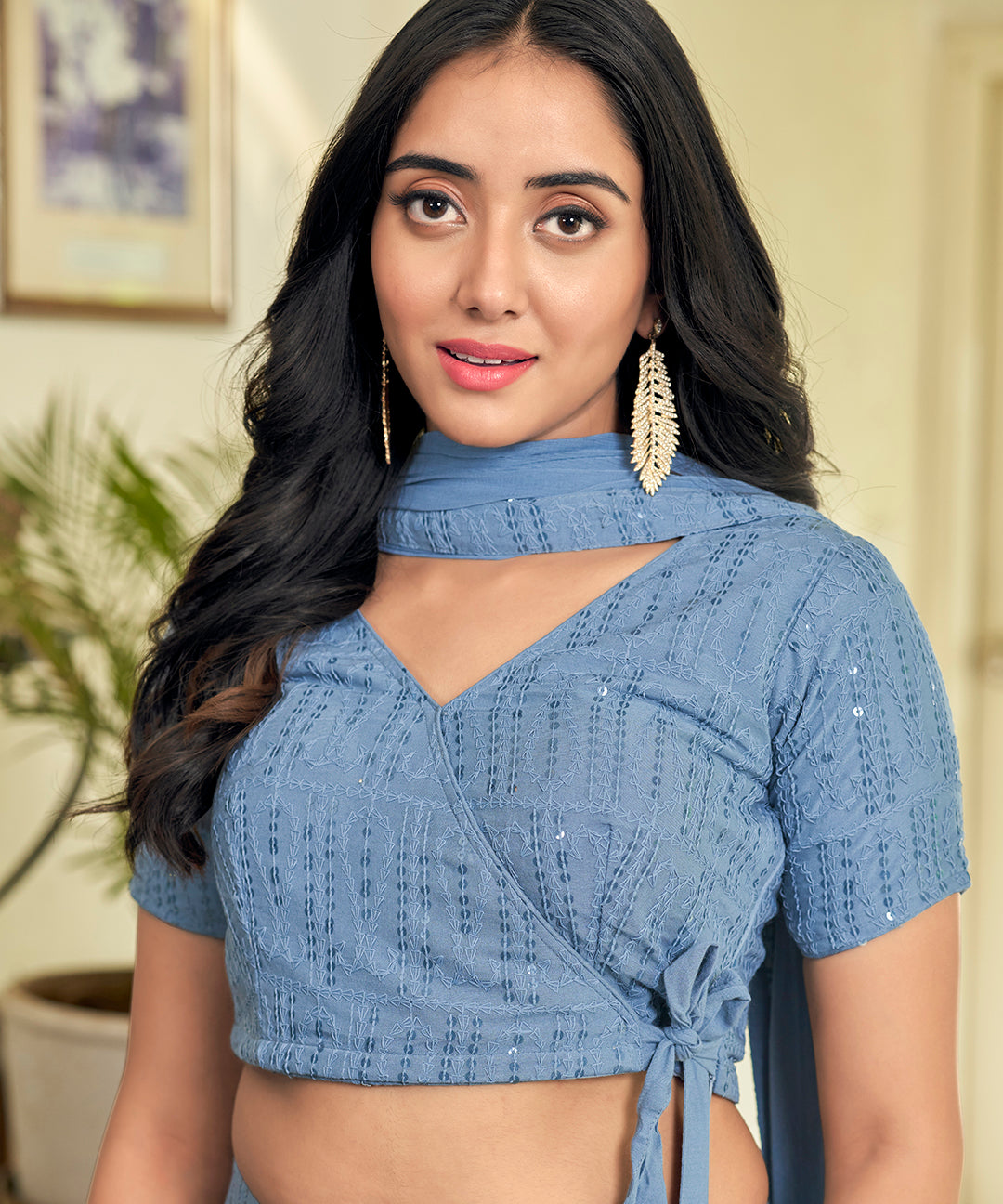 A stylish Powder Blue Rayon Lehenga Set, offering a blend of comfort