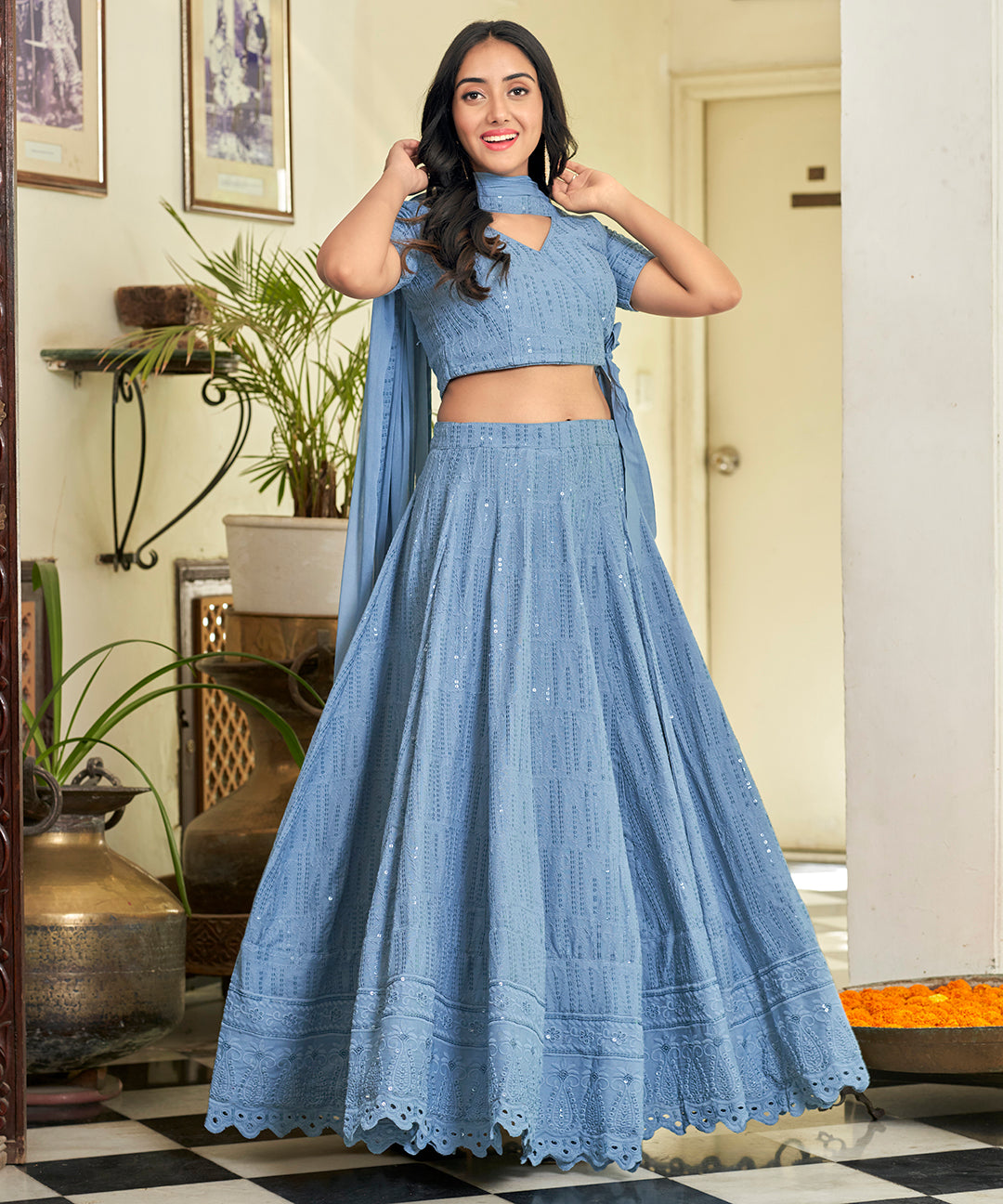 A stylish Powder Blue Rayon Lehenga Set, offering a blend of comfort