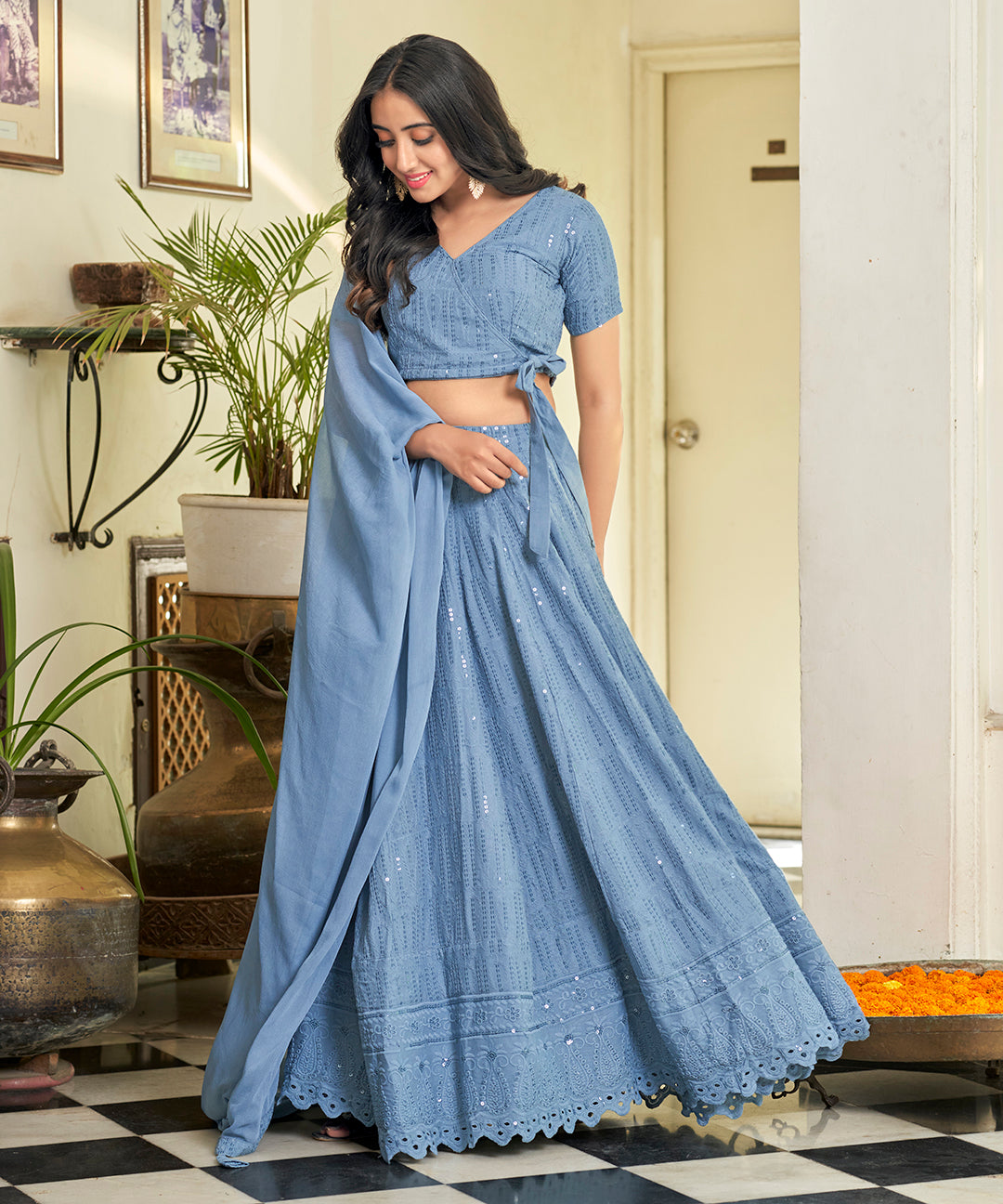 A stylish Powder Blue Rayon Lehenga Set, offering a blend of comfort
