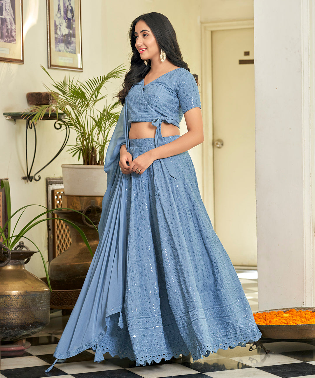 A stylish Powder Blue Rayon Lehenga Set, offering a blend of comfort