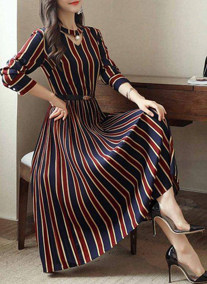 A classic Western look featuring vertical stripes on the garment.