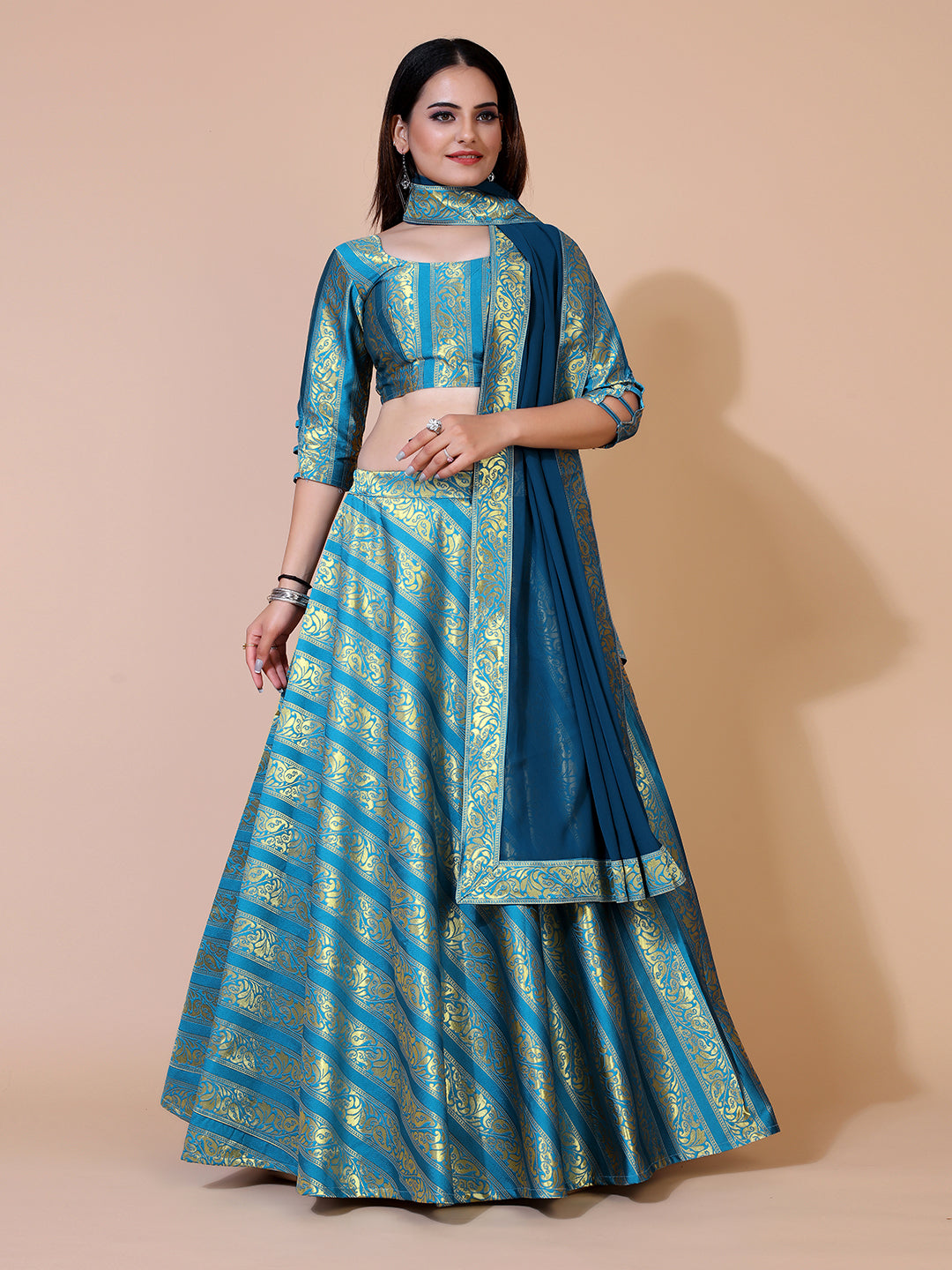 Stunning teal lehenga with a ready-to-wear blouse and matching dupatta, perfect for a festive occasion.