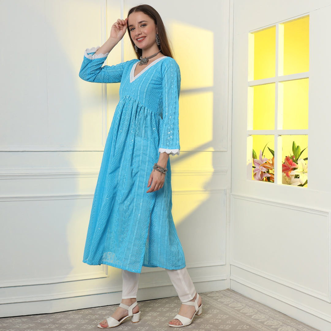 "An elegant A-line kurta featuring intricate ethnic embroidery, blending tradition with contemporary style."