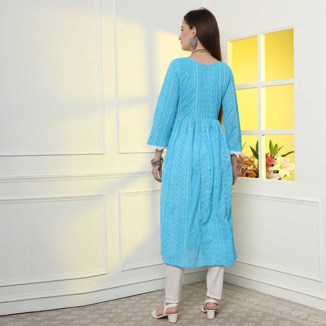 "An elegant A-line kurta featuring intricate ethnic embroidery, blending tradition with contemporary style."