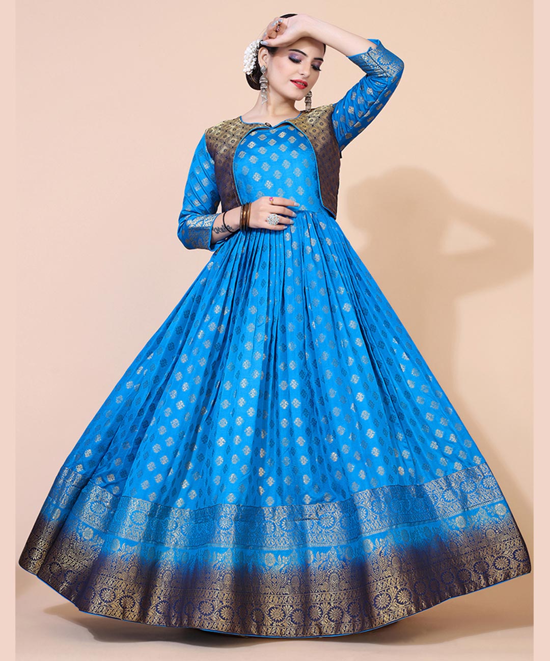 Turquoise blue jacquard maxi dress adorned with ethnic motifs, perfect for cultural and festive occasions.