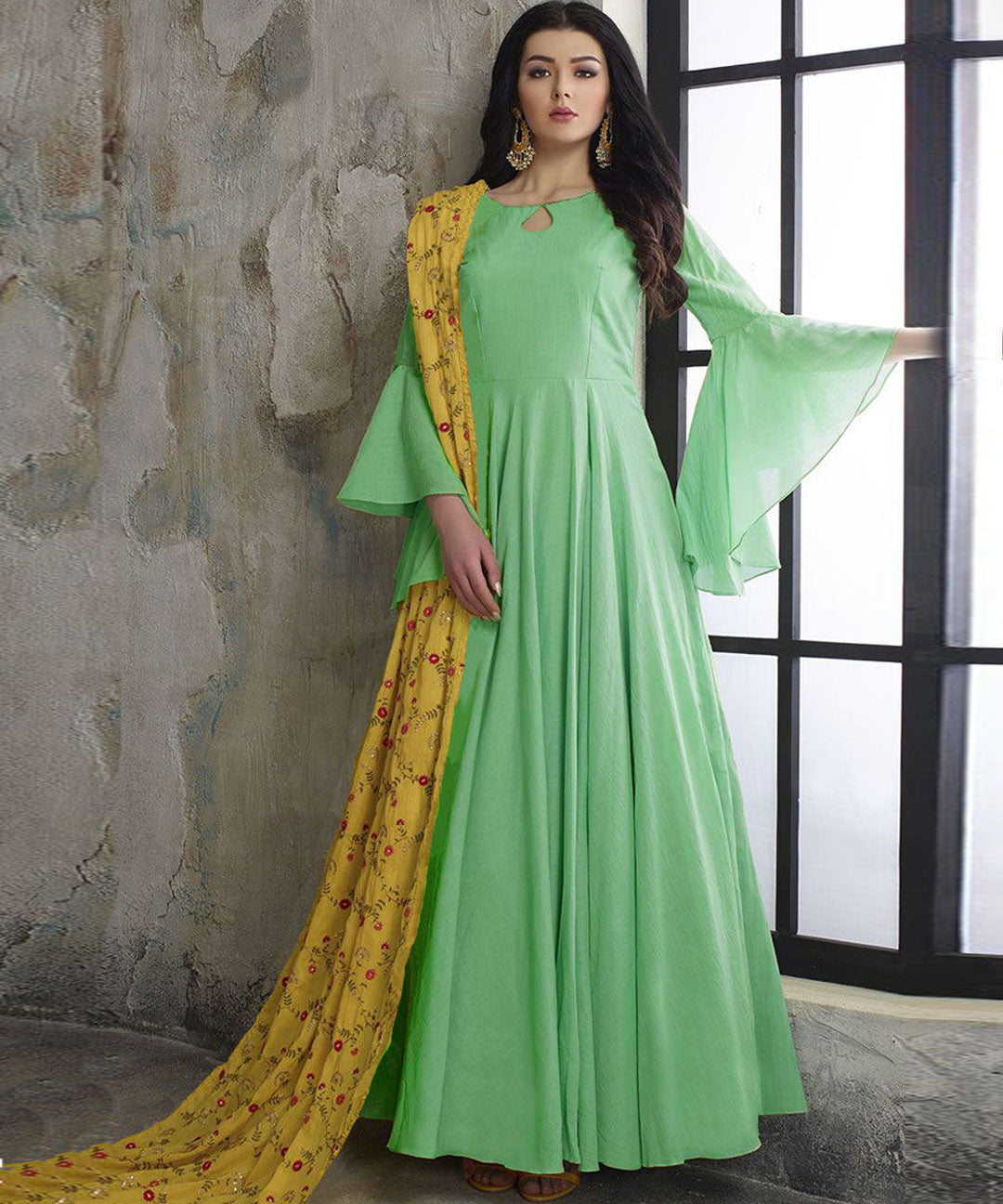 Demure pastel green designer wear long dress With Embroidered Dupatta
