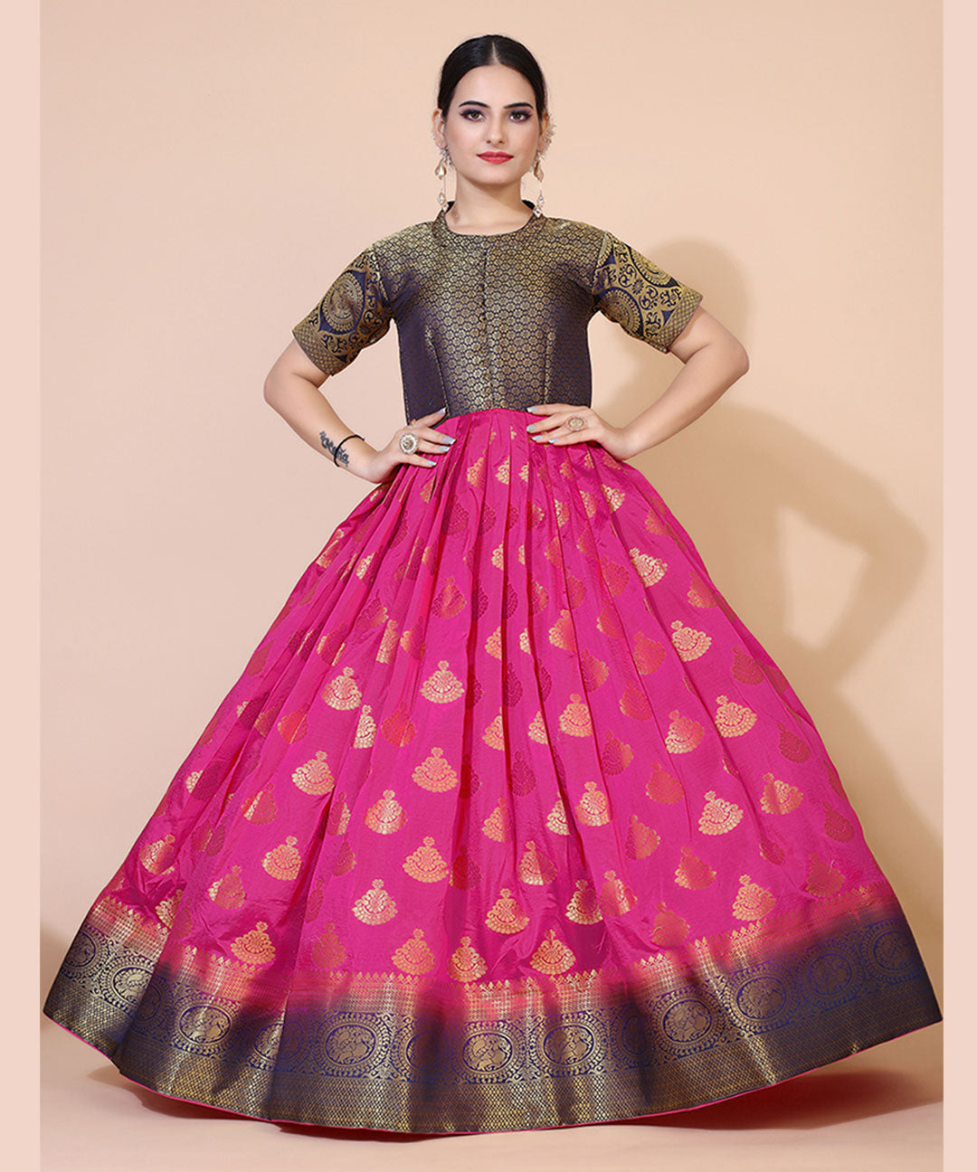 Women's magenta jacquard maxi dress adorned with ethnic motifs, perfect for cultural and festive occasions.