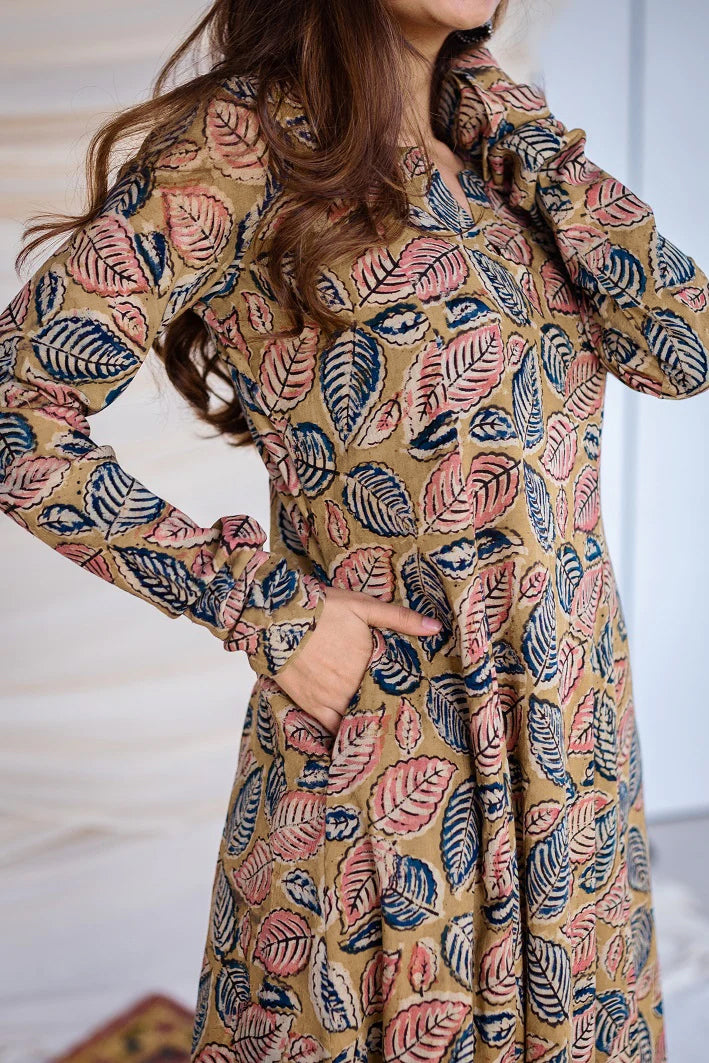 Sunny Yellow Kurta with Pockets: A cheerful yellow kurta made from comfortable cotton, featuring traditional Kalamkari designs and handy pockets.