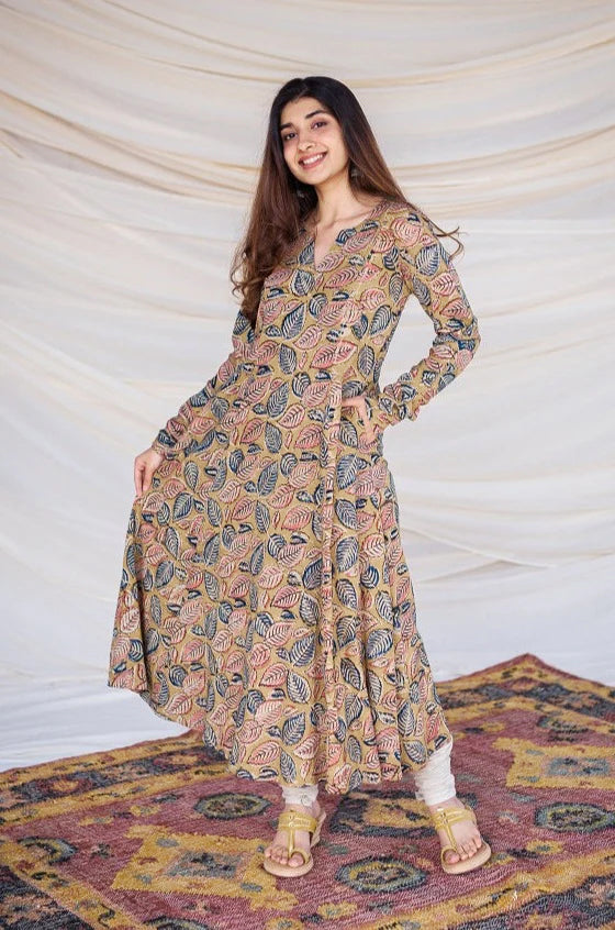 Sunny Yellow Kurta with Pockets: A cheerful yellow kurta made from comfortable cotton, featuring traditional Kalamkari designs and handy pockets.