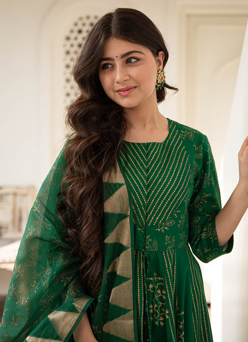 Magnetic green colored front slit stitched woven jacquard suit set, ideal for elegant and festive occasions.