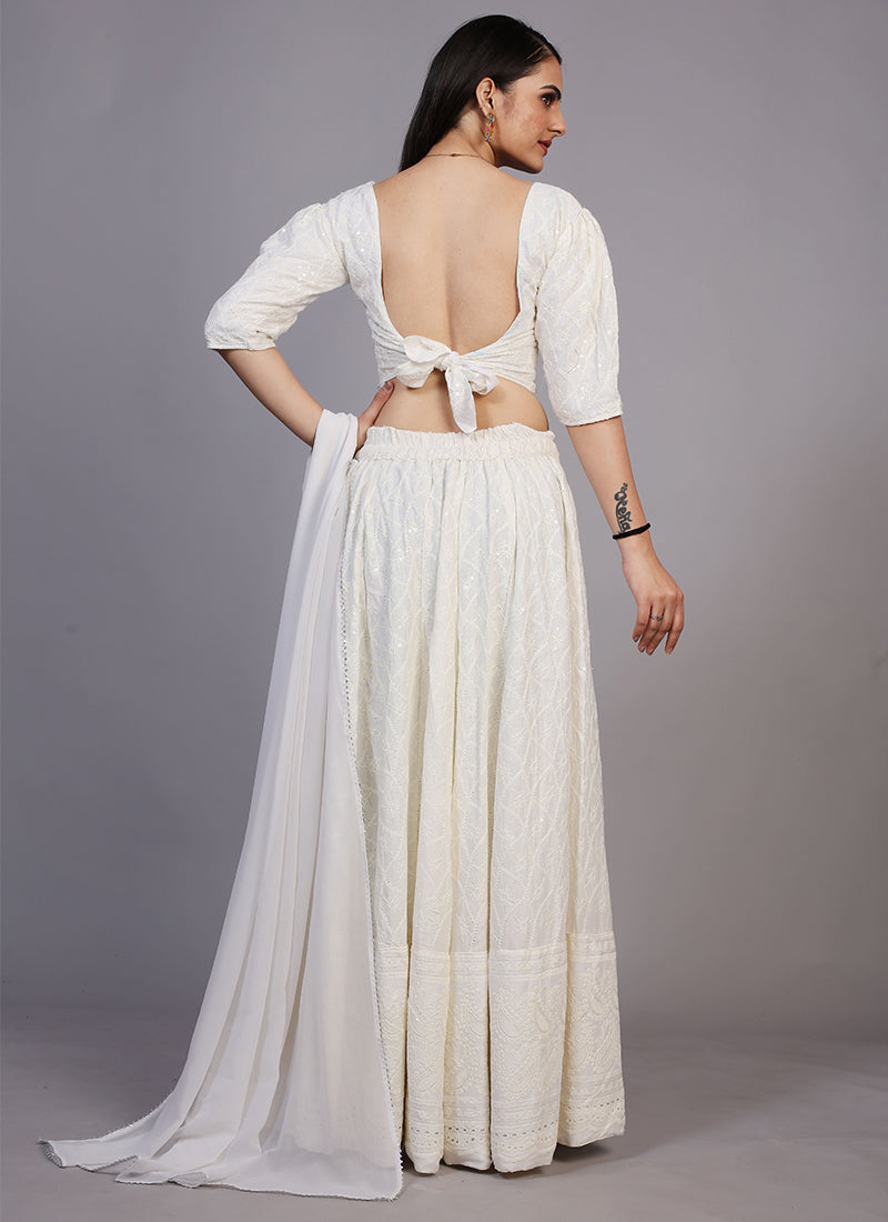Milky white Chikankari lehenga, perfect for traditional and festive occasions with intricate embroidery.
