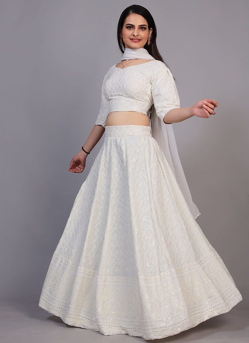 Milky white Chikankari lehenga, perfect for traditional and festive occasions with intricate embroidery.