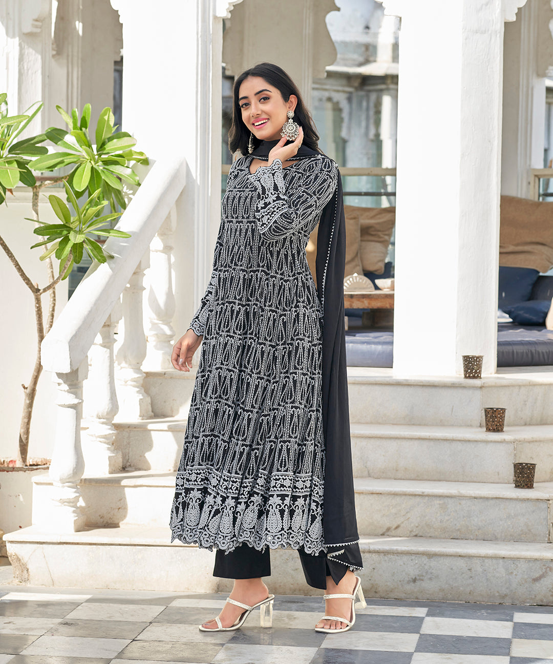 A sophisticated Black Irish Chikankari Suit Set, adorned with delicate chikankari embroidery for a timeless and elegant look.