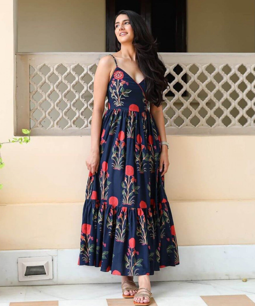 A floral print V-neck maxi dress with a fit and flare silhouette.